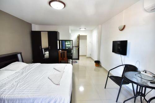 Escobar Guesthouse Джомтьен Экстерьер фото